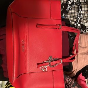 Red leather Guess bad